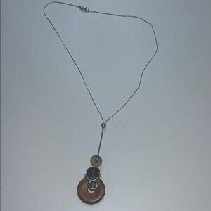 Brown Natural Material Necklace with Delicate Chain and Earthy Pendant